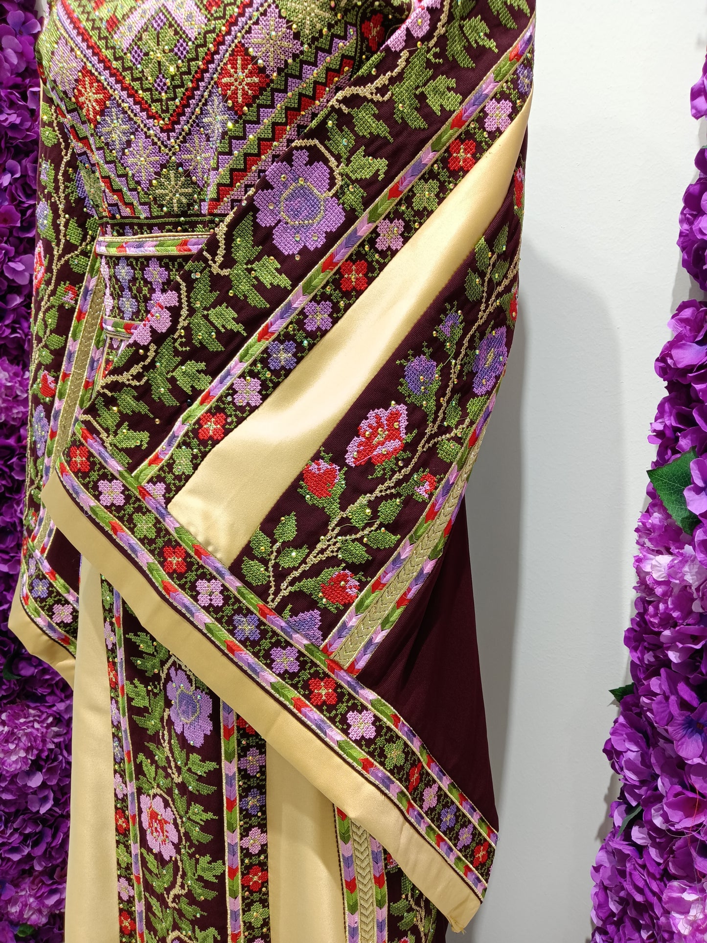 Colorful embroidered fabric with floral patterns