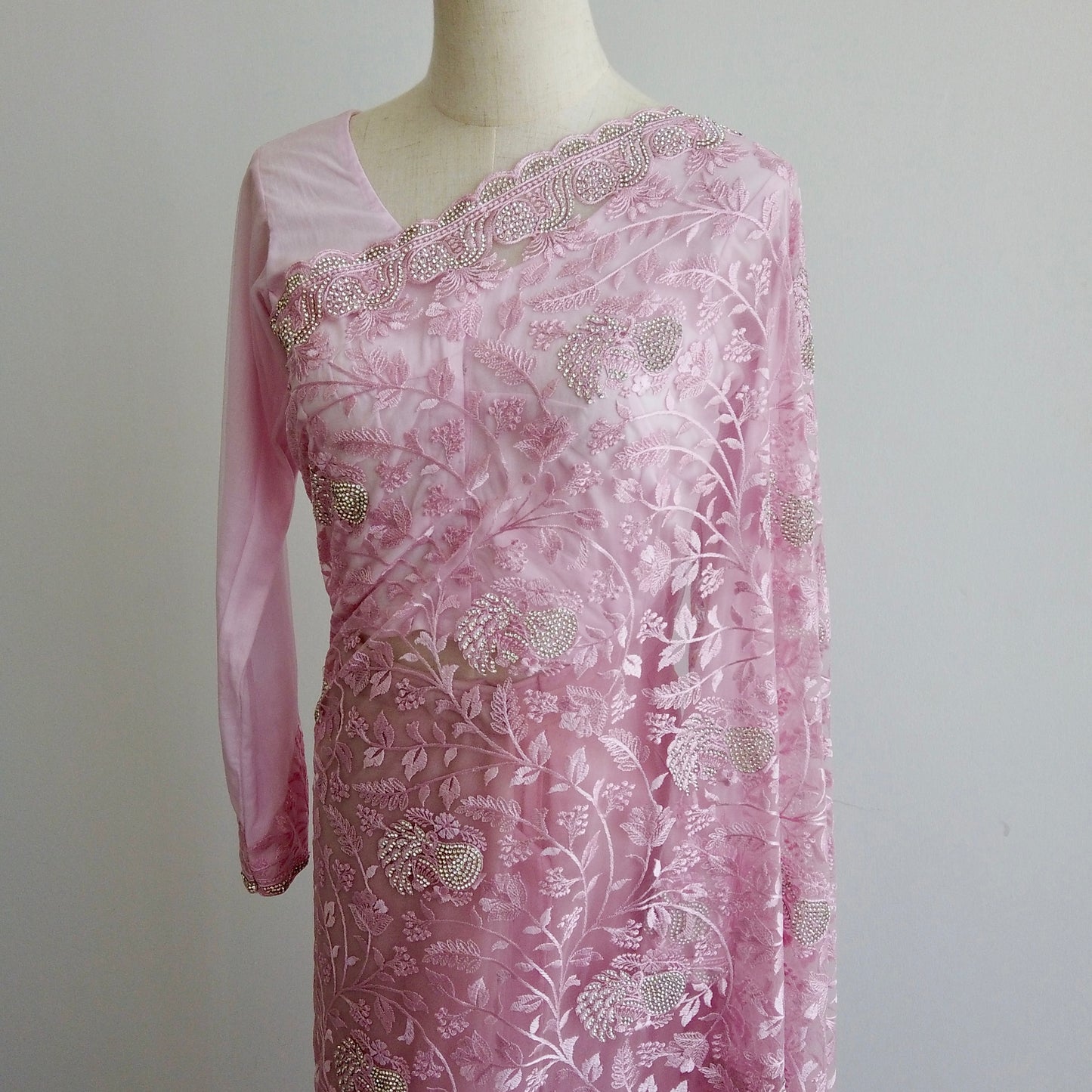 Pastel pink embroidered net saree with satin lining – ready to wear by Arisca Qatar