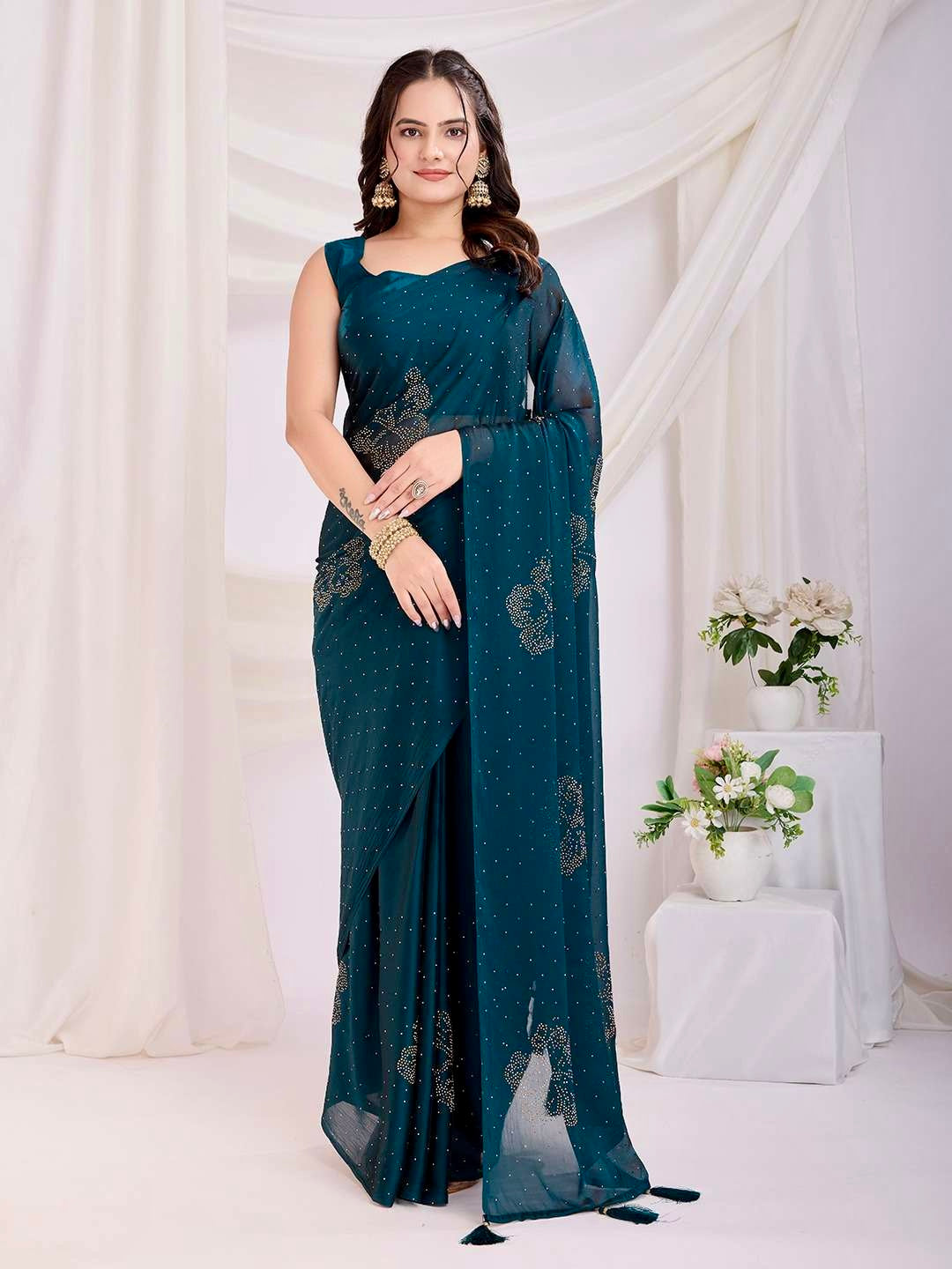 Green embellished saree with floral stone detailing and elegant drape