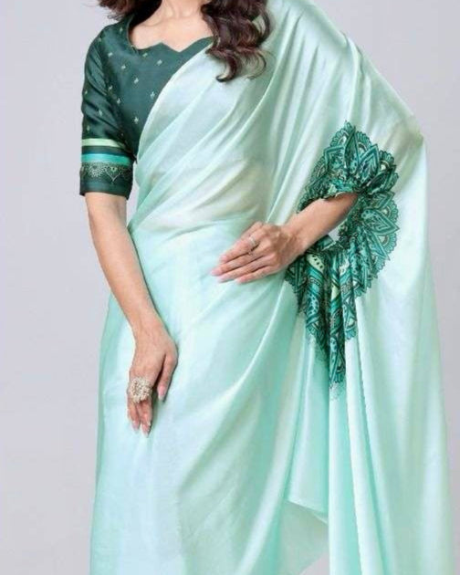 Designer freehand saree with green and white pattern on a plain background