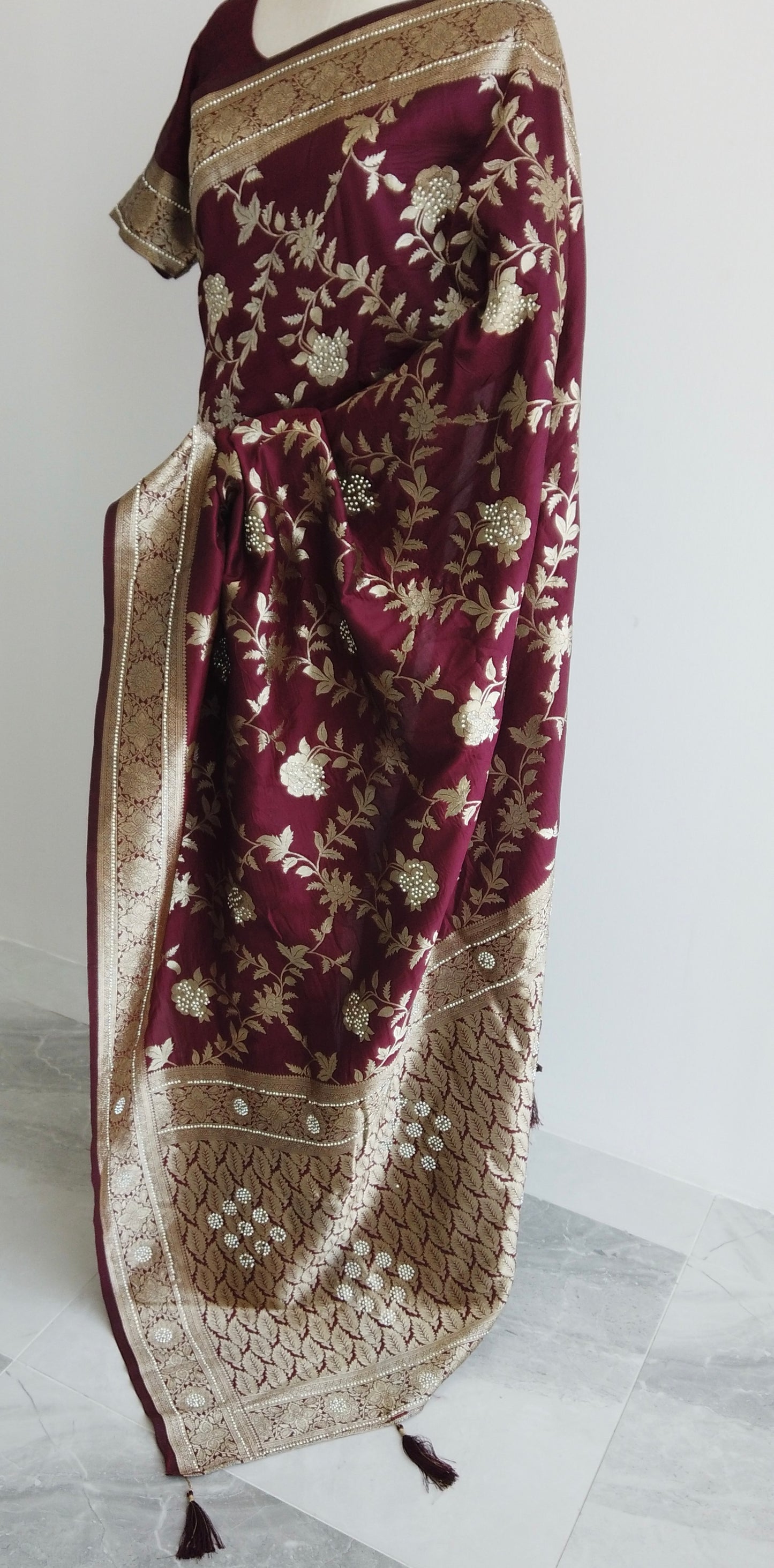 Graceful draped silhouette of Banarasi silk saree with luxurious embroidery - traditional craftsmanship enhanced for contemporary fashion