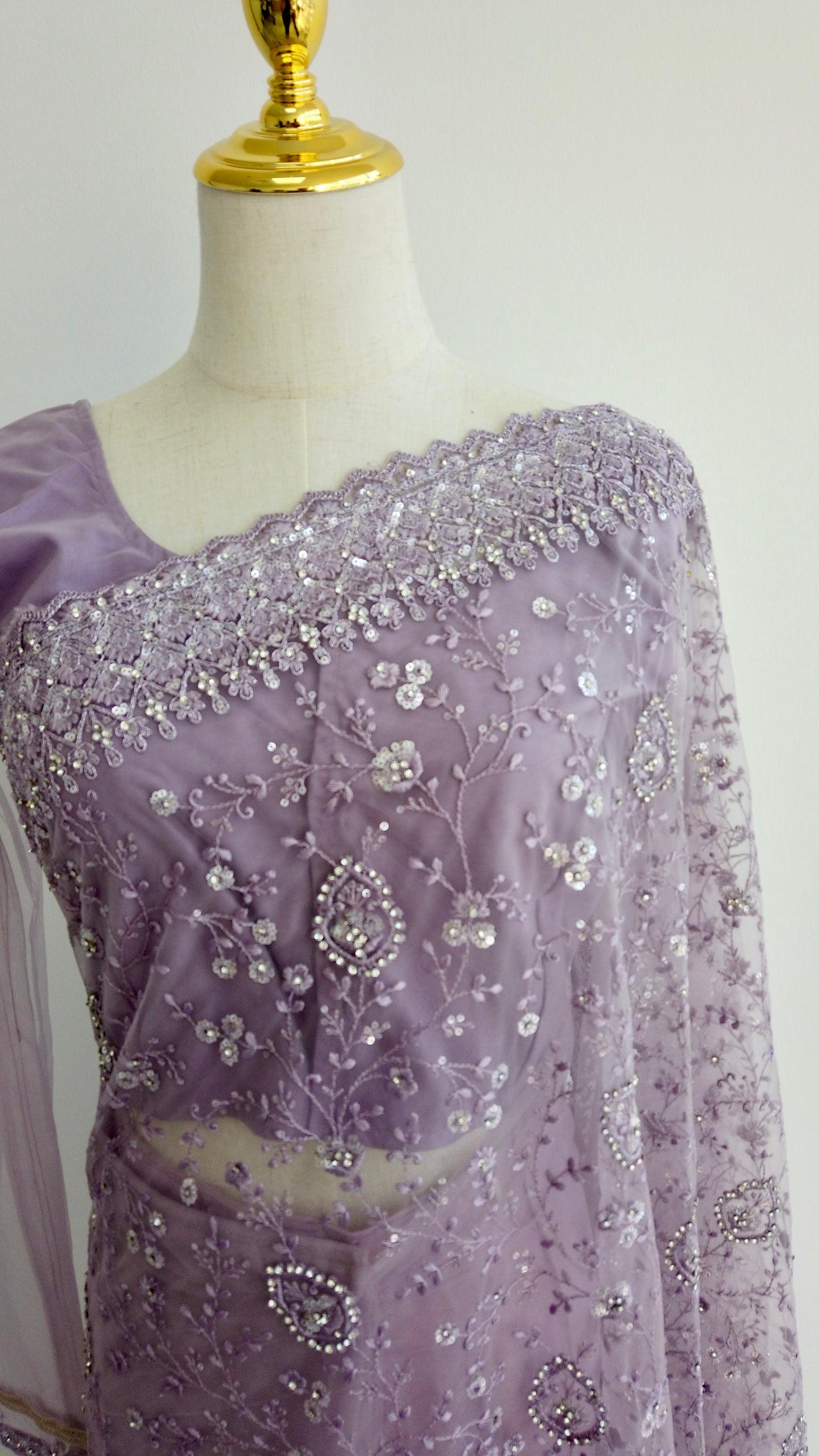 Lavender ready-to-wear saree styled for formal occasions, weddings, and evening gatherings - effortless sophistication.