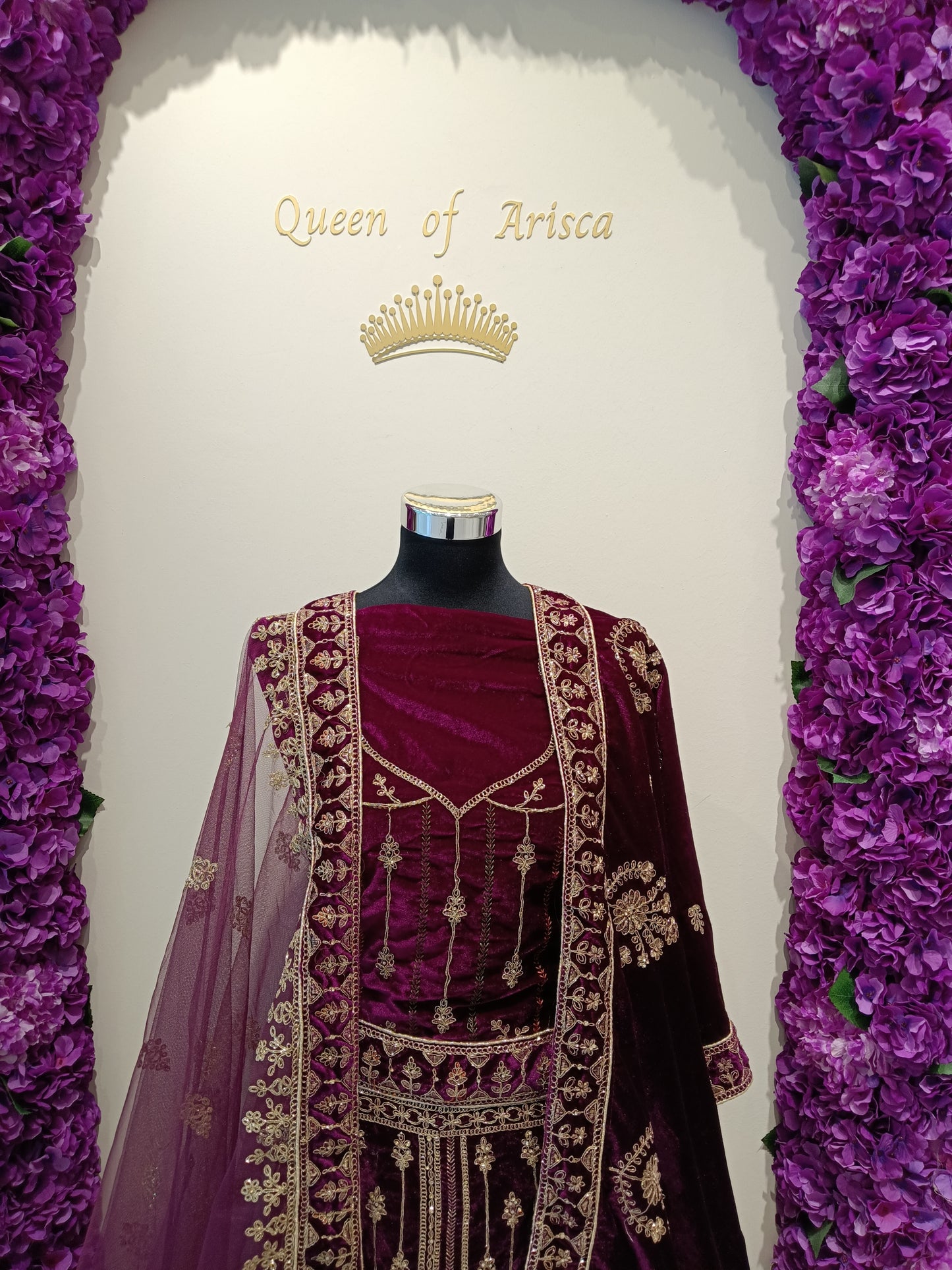 Maroon Premium velvet lehenga with dense zari, stone, and thread work.