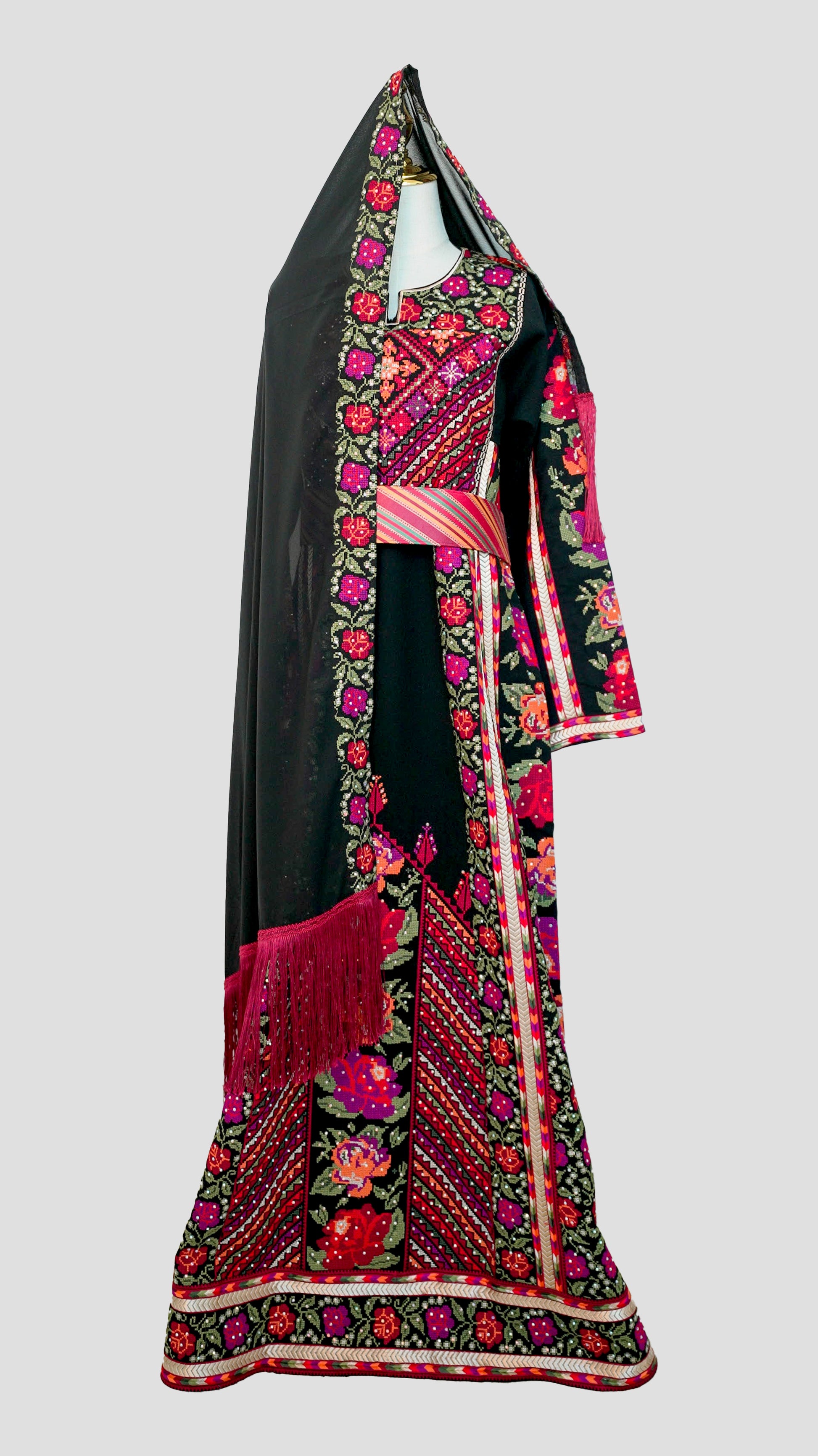 Full-length image highlighting the craftsmanship and cultural richness of the design.