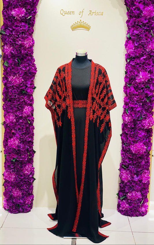 A black maxi dress with red embroidered patterns.