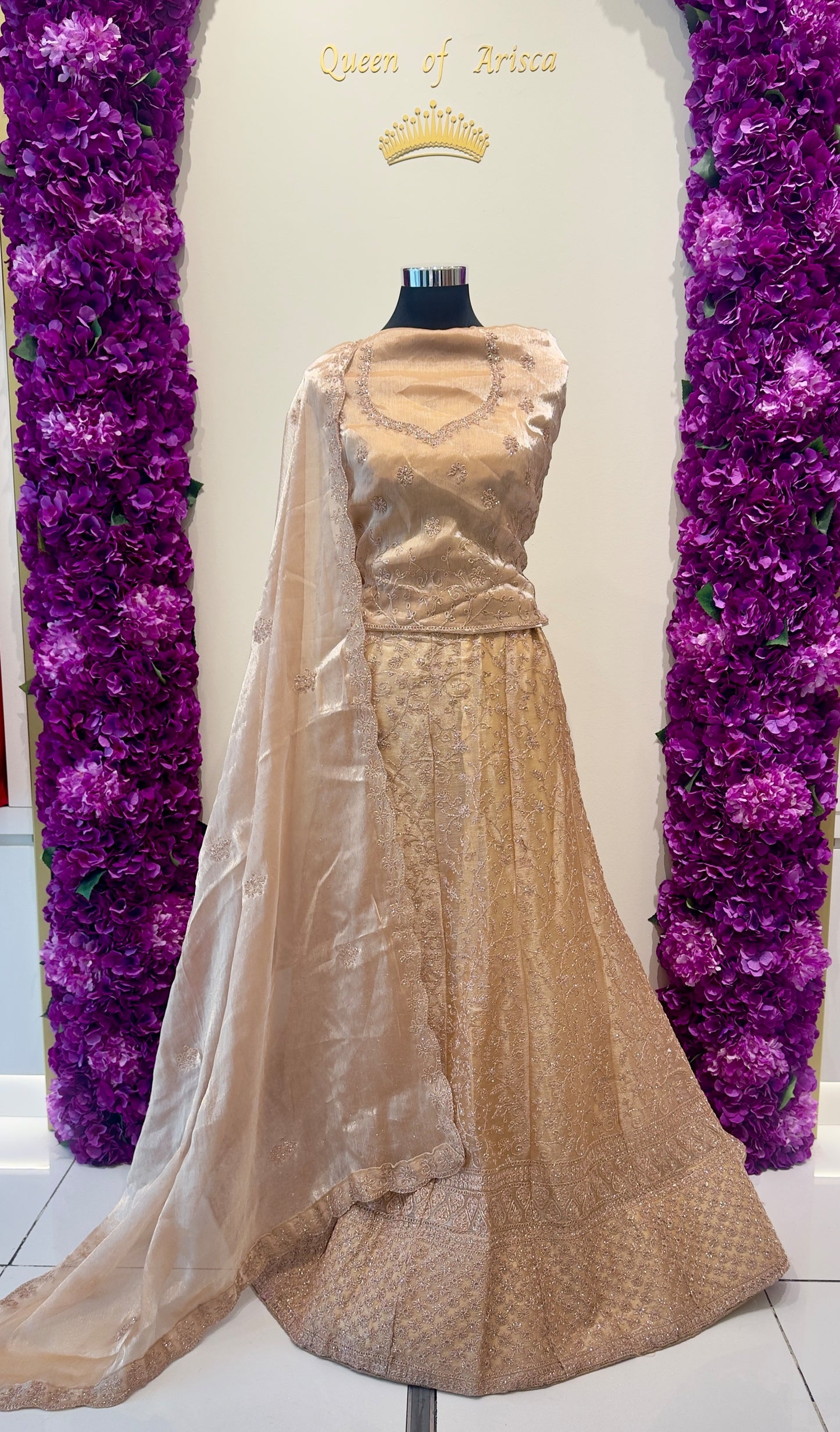 luxurious Champagne Gold Lehenga featuring intricate embroidery, premium craftsmanship.
