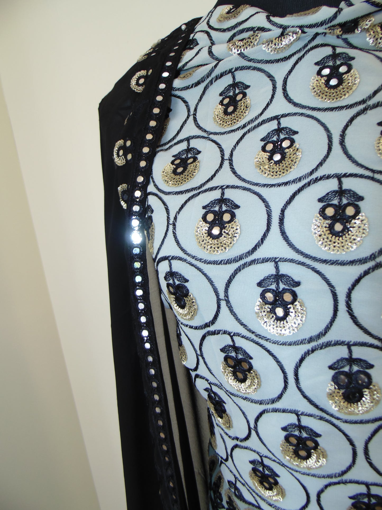 Decorative fabric with floral patterns on a light blue background