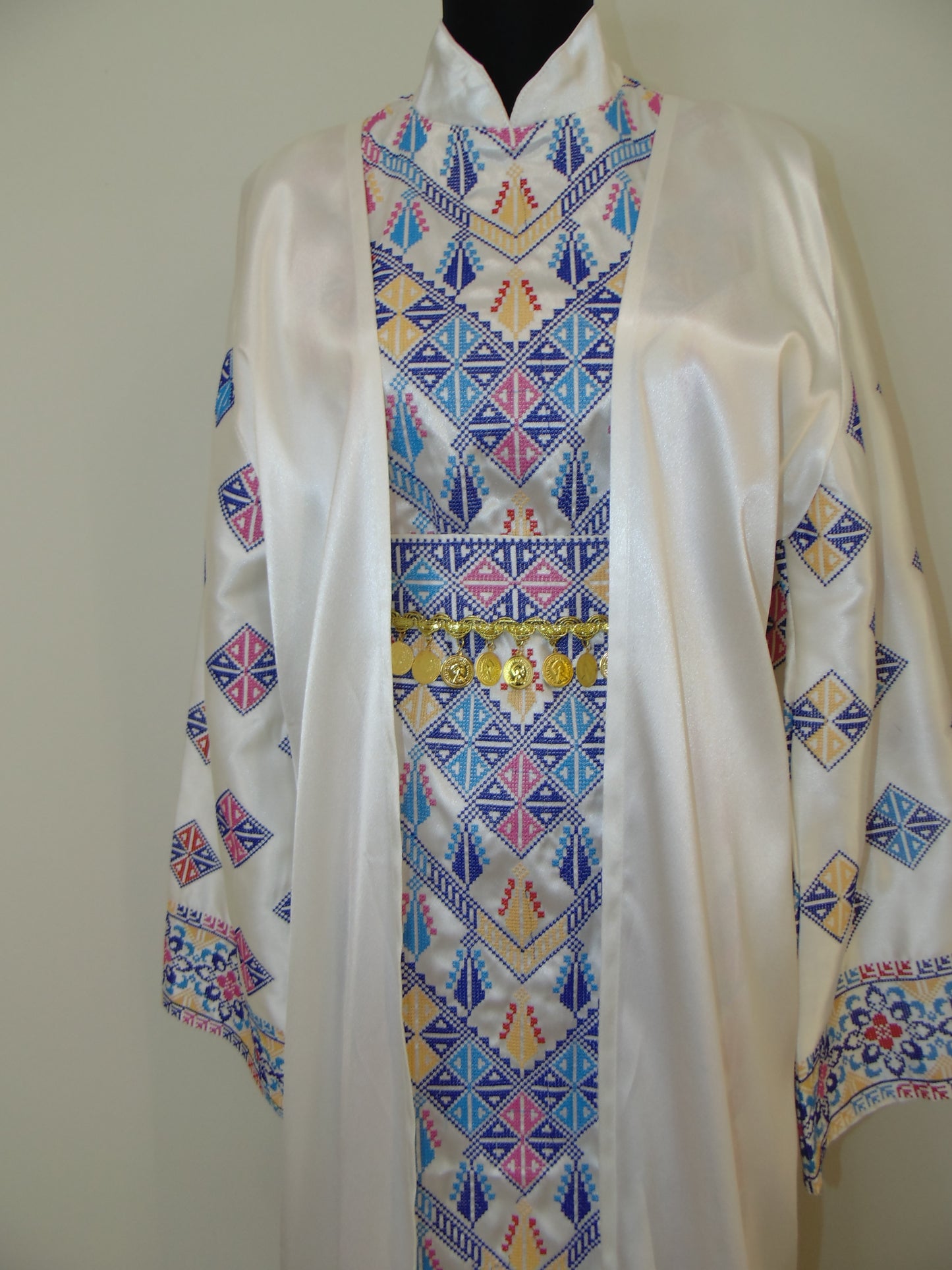 Colorful geometric patterned fabric on a white background