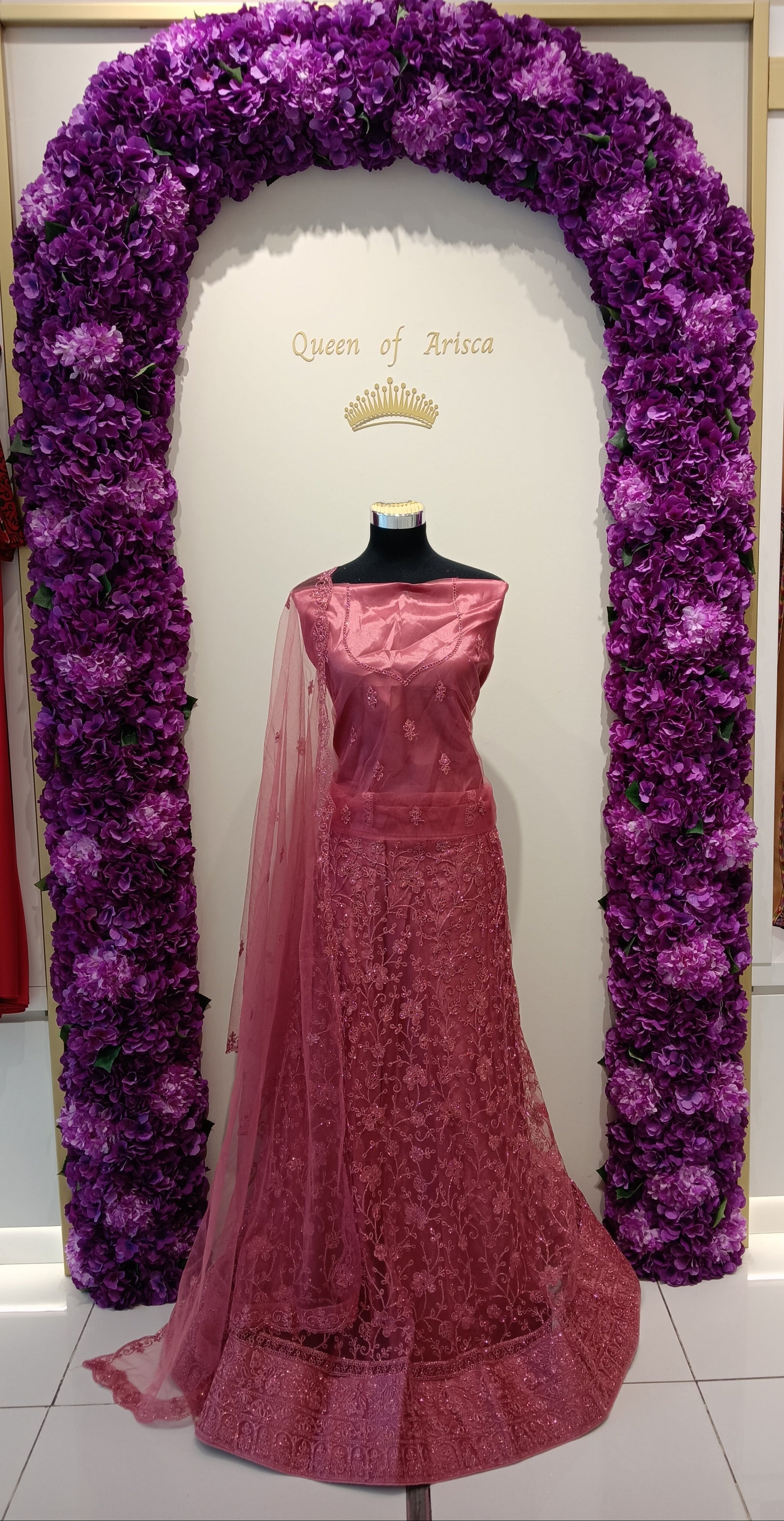 vibrant fuchsia pink lehenga is covered in all-over glitter and sequin work for ultimate glamour.