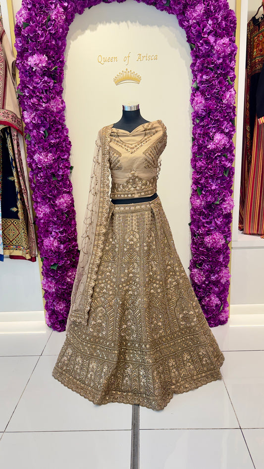Golden Lehenga from Arisca Qatar