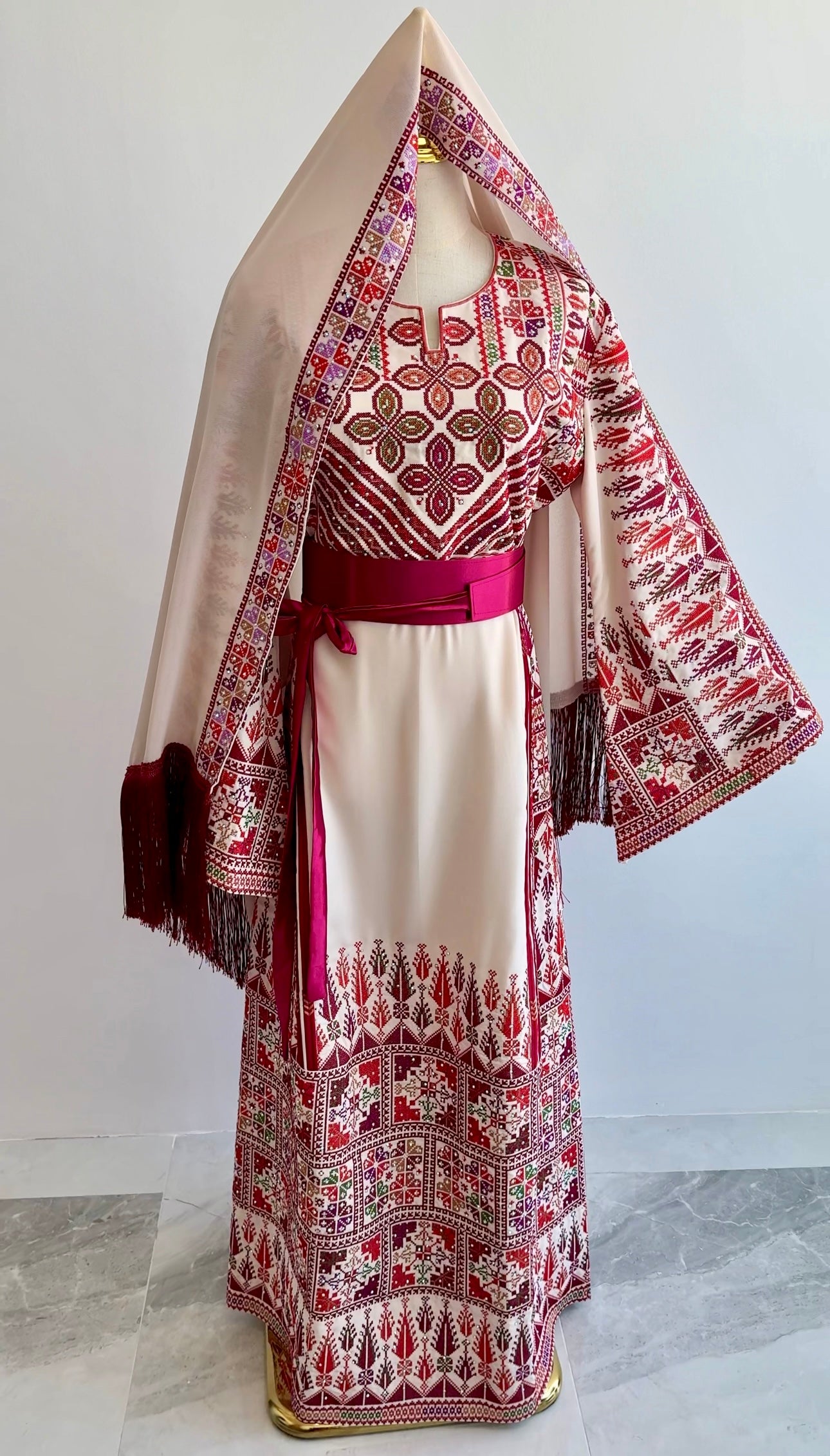 Traditional Palestinian thobe in black and red with multicolor floral embroidery and cream shawl – Arisca Qatar