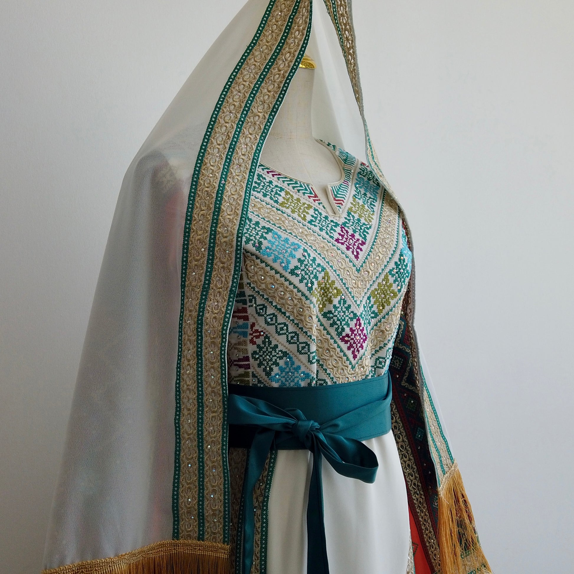 Palestinian thobe with multicolor Tatreez embroidery and gold fringe sleeves – Arisca Qatar