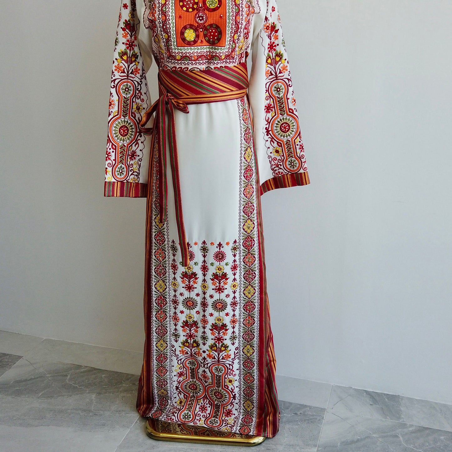 Full-length traditional white thobe with tatreez, belt and fringed shawl