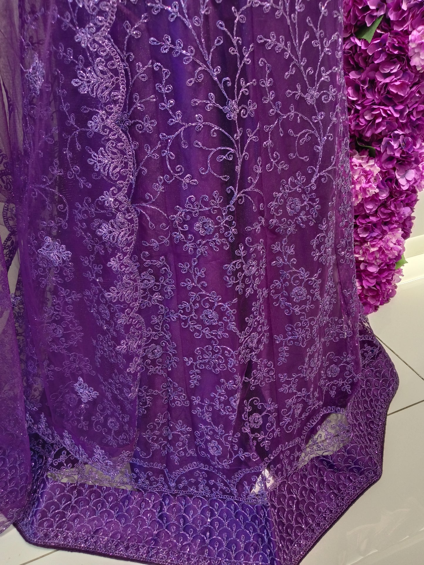 Lehenga Skirt: Embroidered net with tonal thread and tonal purple embroidery