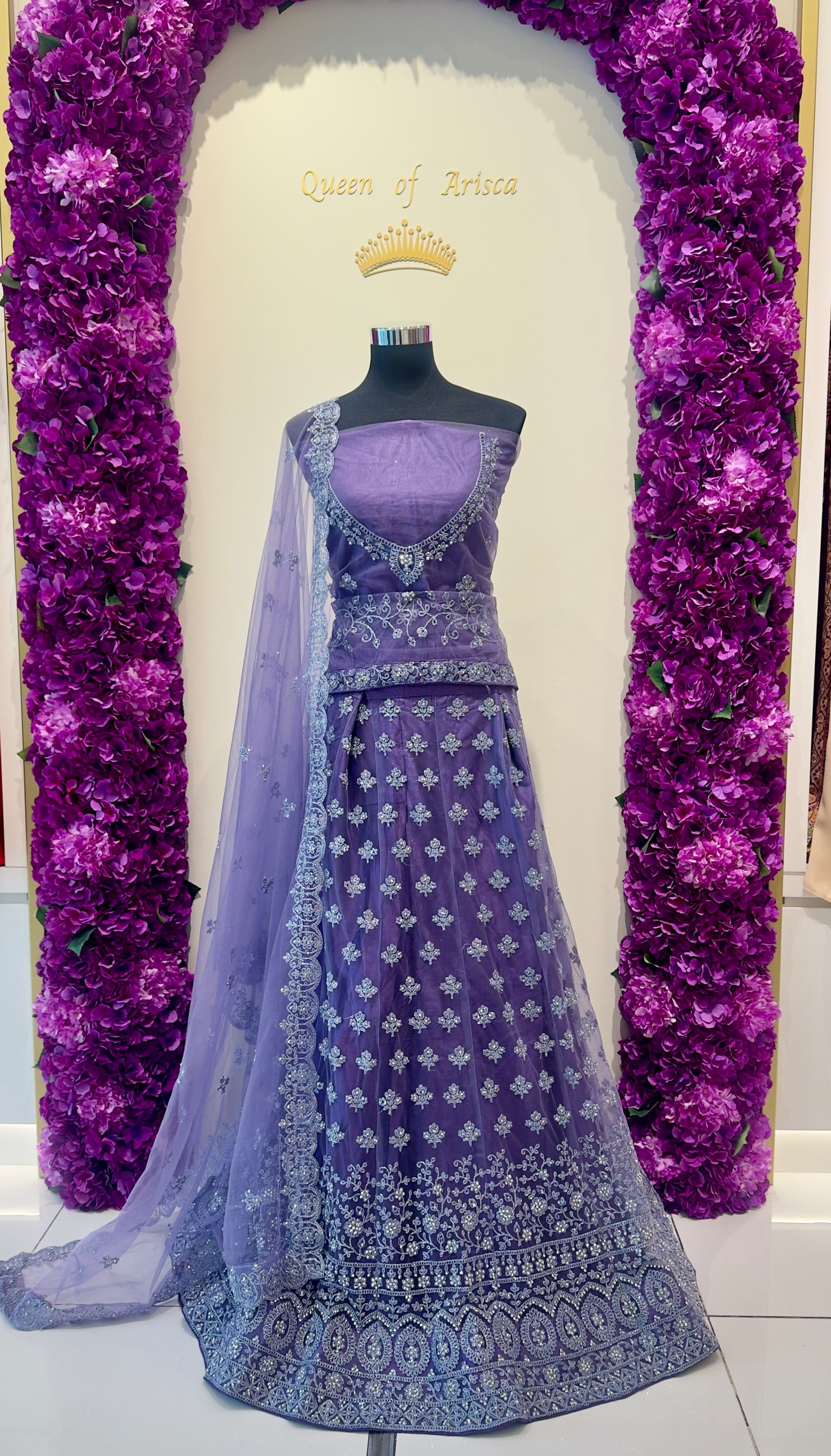 elegant Lavender Purple Lehenga featuring detailed silver embroidery, luxurious fabric, and sophisticated traditional styling.