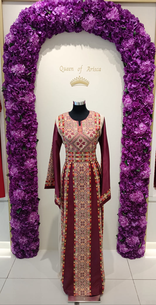 maroon Palestinian embroidered thobe in Qatar. Elegant, cultural dress for weddings, Eid & special events.