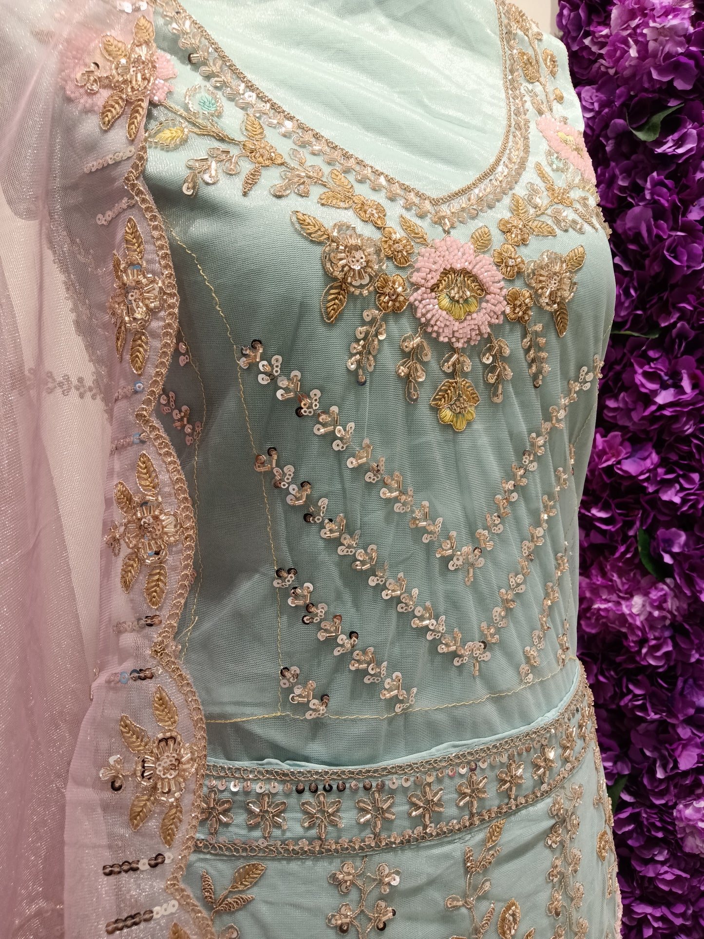 Blouse: Mint silk with embroidered neckline , Dupatta: Blush pink net dupatta with scalloped gold border