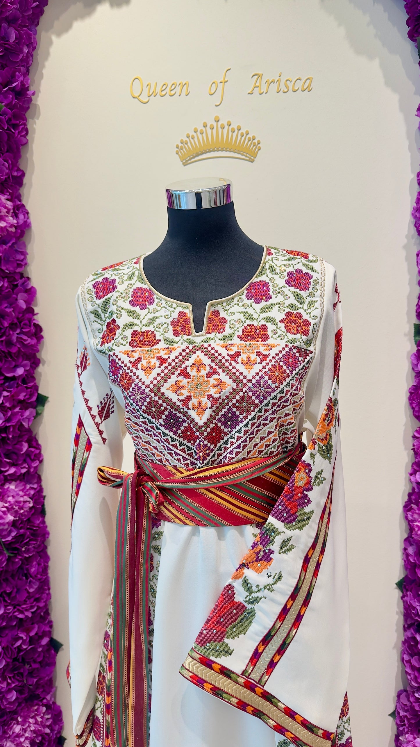 Palestinian Thobe, hand‑embroidered with vibrant floral and geometric patterns. 