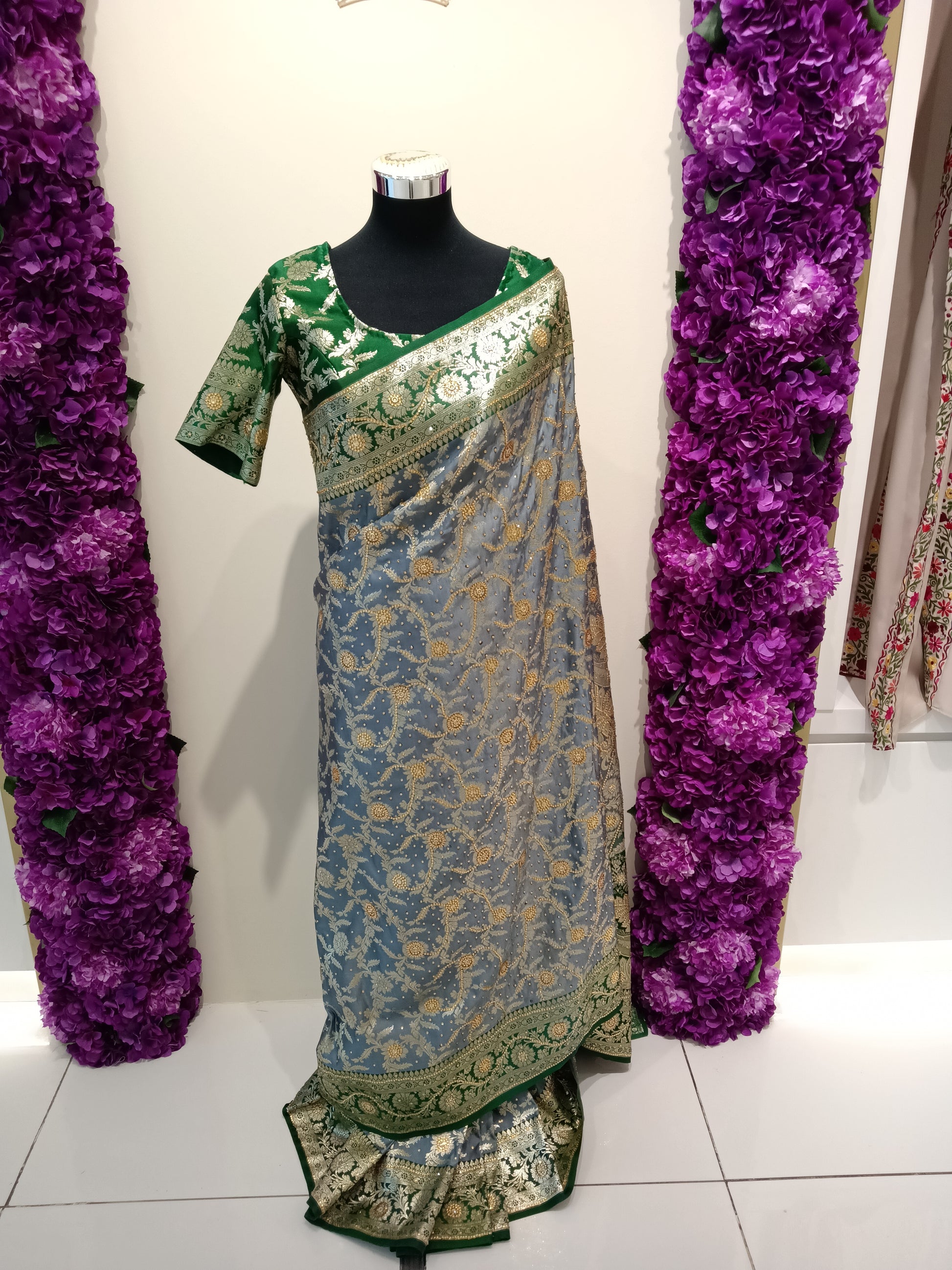 Traditional saree with green and gold border 