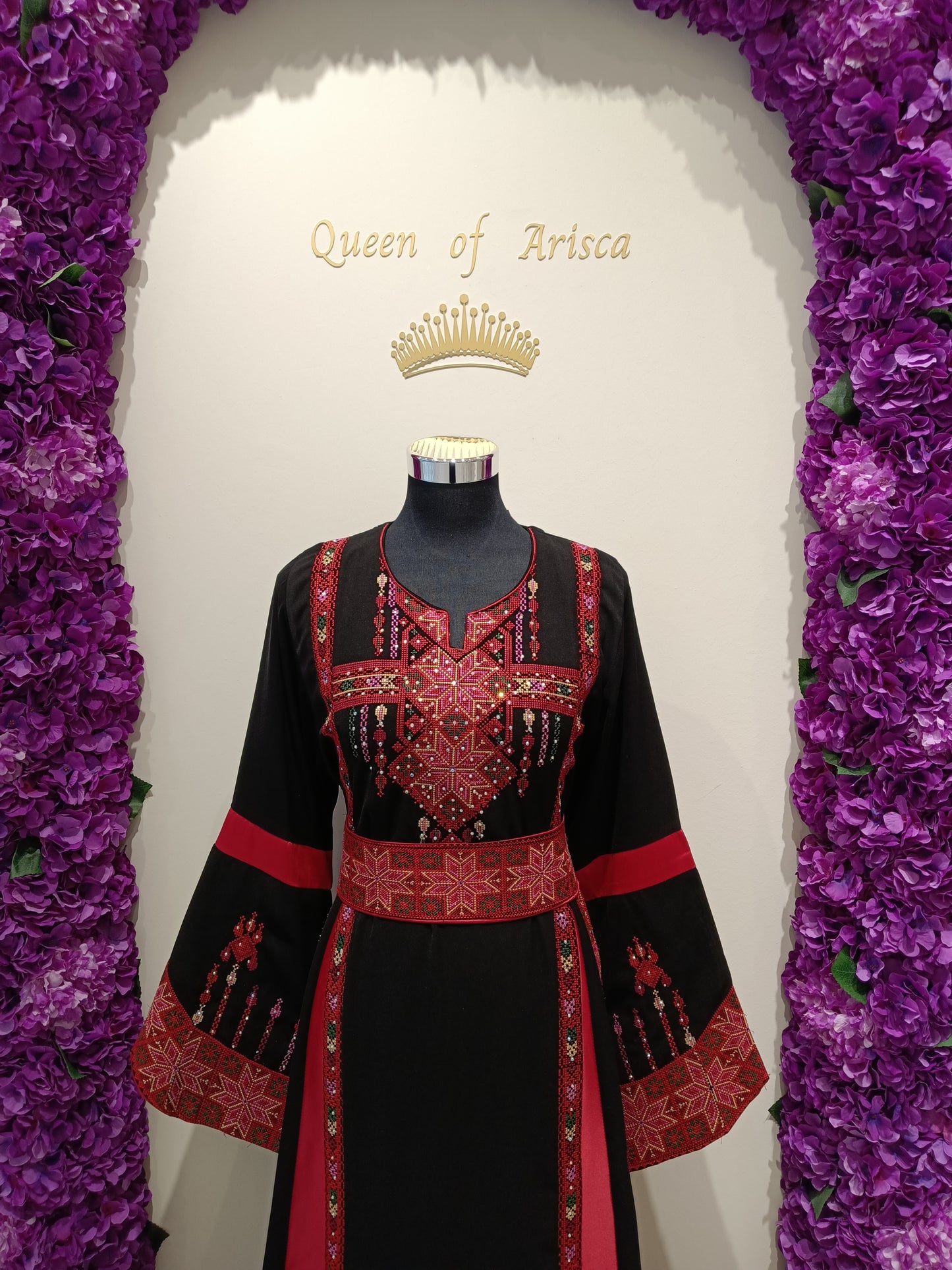 stunning black and red Palestinian thobe featuring authentic embroidery.