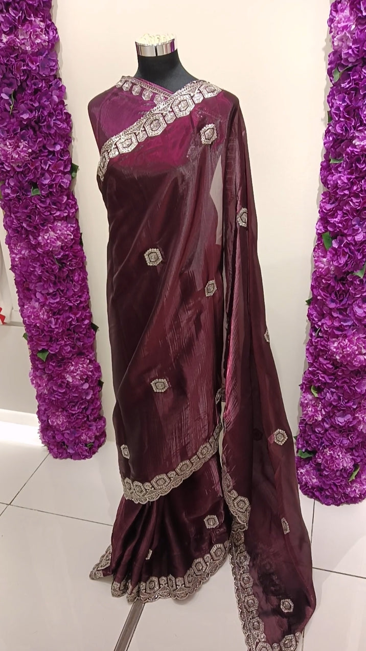 wine maroon ready to wear saree, crafted in premium soft tissue silk fabric for a graceful drape and luxurious shimmer finish