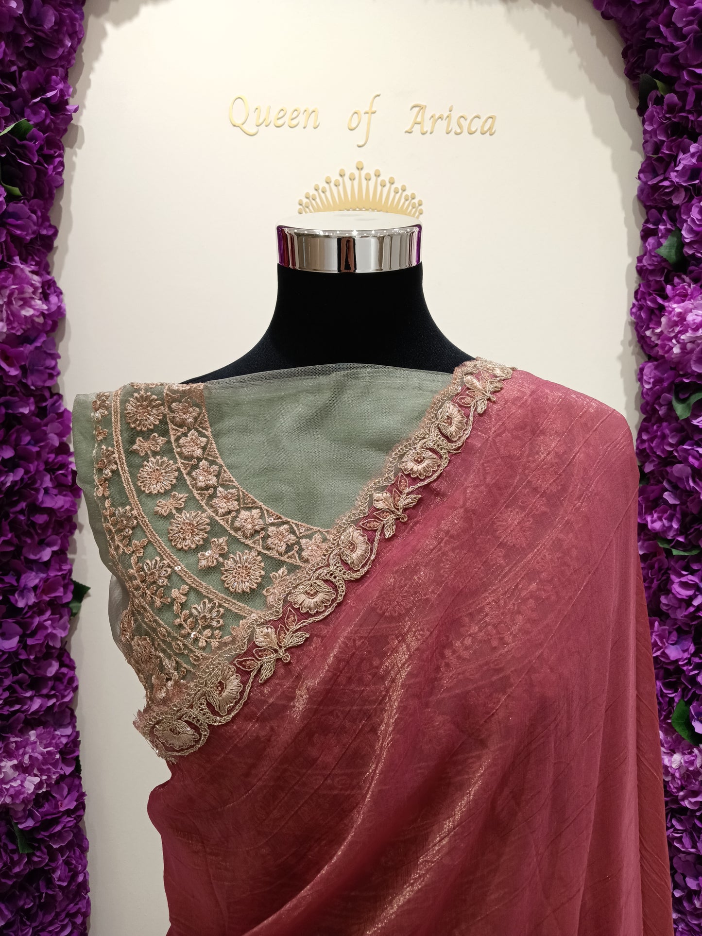 saree is crafted from a soft shimmer tissue / linen blend fabric with a lightweight feel, graceful drape, and elegant natural texture. The color is a rich dusty rose / deep blush pink, It is beautifully finished with a delicate gold embroidered lace border, adding festive elegance.