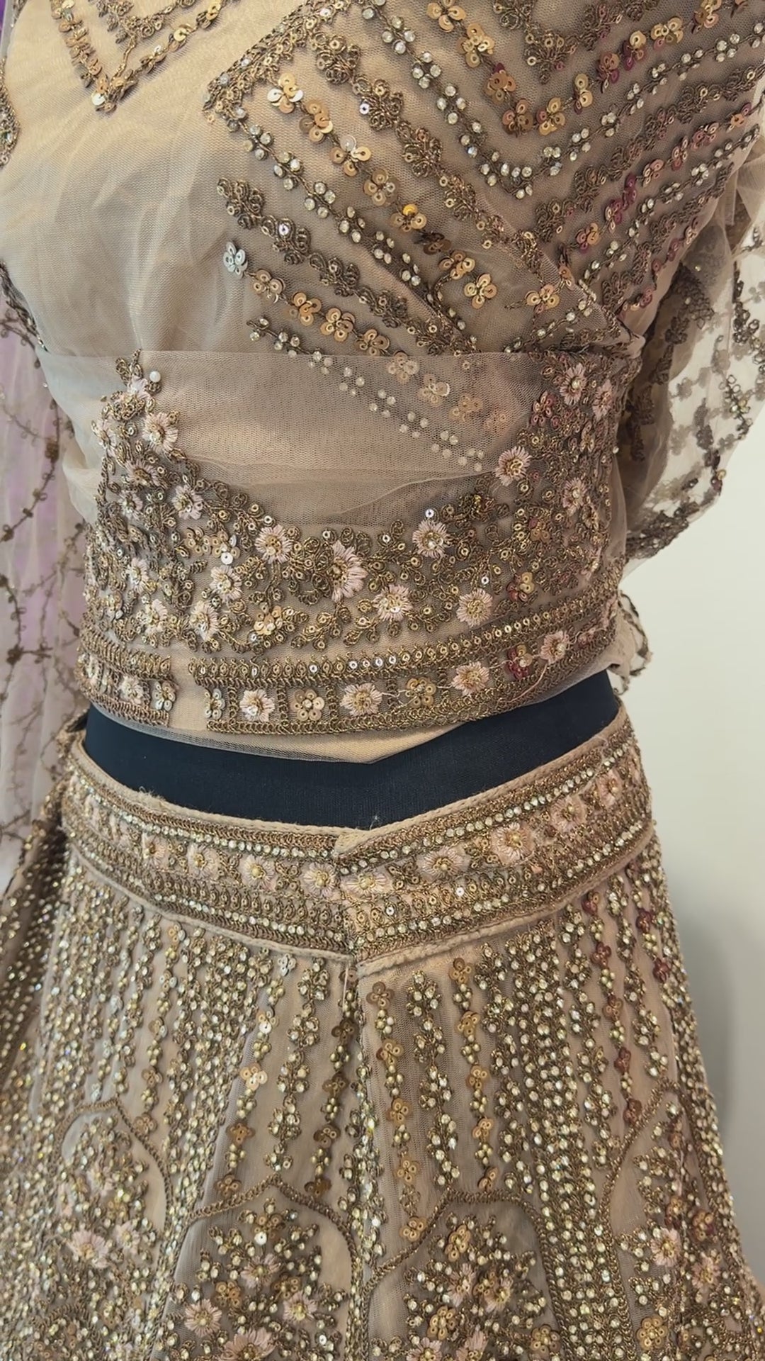 details of golden Indian Lehenga