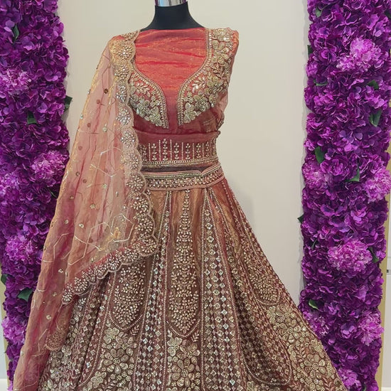 Luxury green embroidered lehenga in Qatar by Arisca