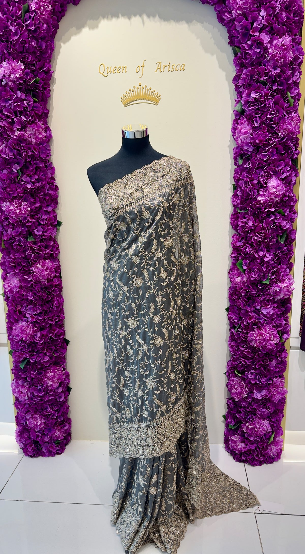 A luxurious ready-to-wear pre-stitched saree crafted from premium soft net and shimmer organza-inspired fabric